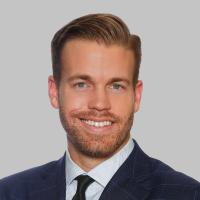 Professional photo of Berkadia Associate Director Aron Procuniar
