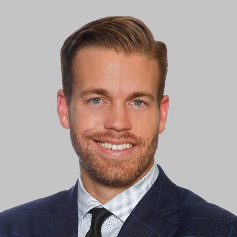 Professional photo of Berkadia Associate Director Aron Procuniar